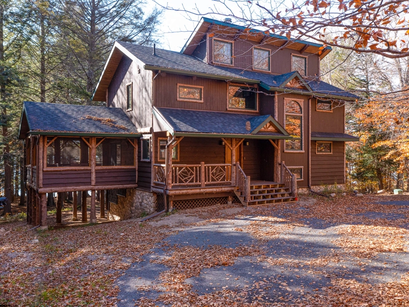 Adirondack home renovation exterior at Gull Pond Residence