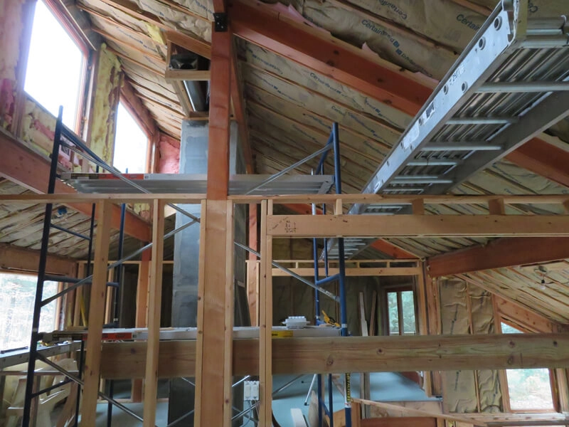 Framing and structural layout during pre-construction of a custom home in the Adirondacks